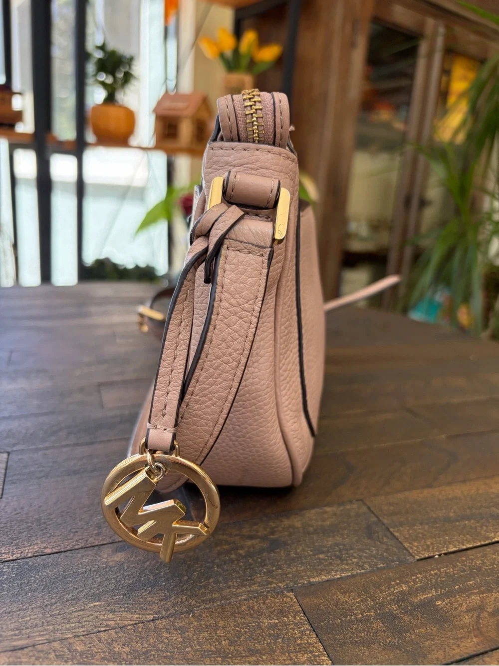 Michael Kors Blush Pebbled Leather Crossbody Bag with Gold Hardware and charm